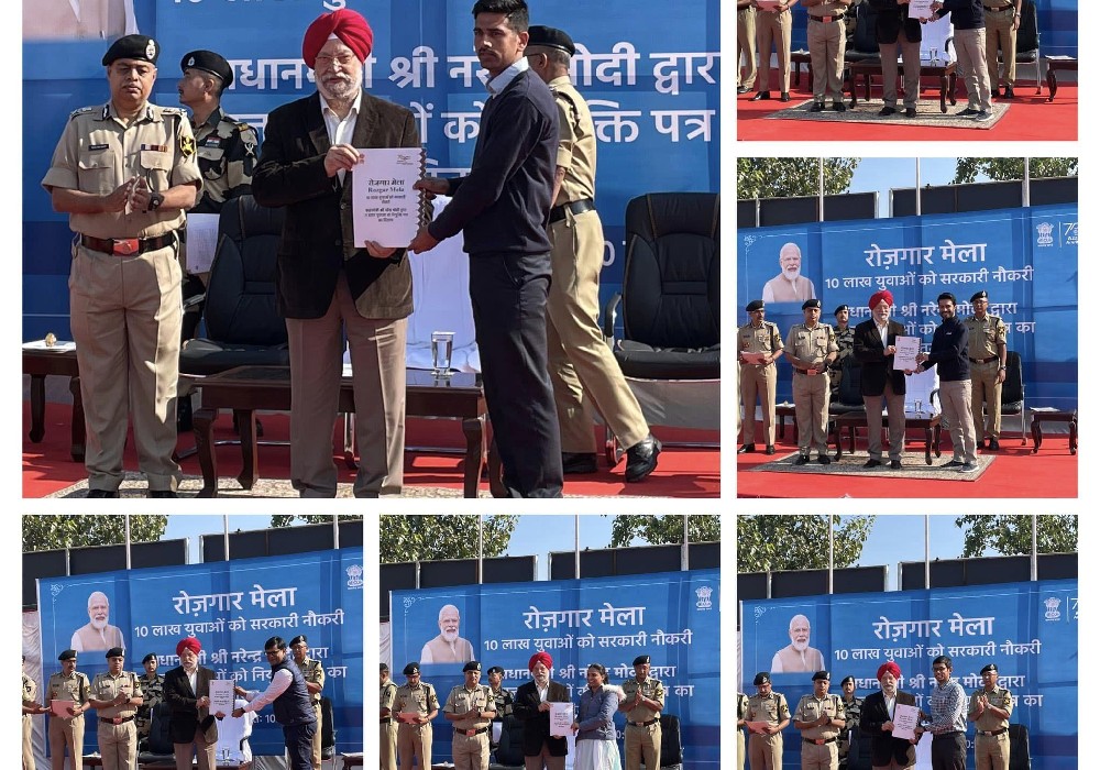 Handing over appointment letters to new recruits at the Rozgar Mela